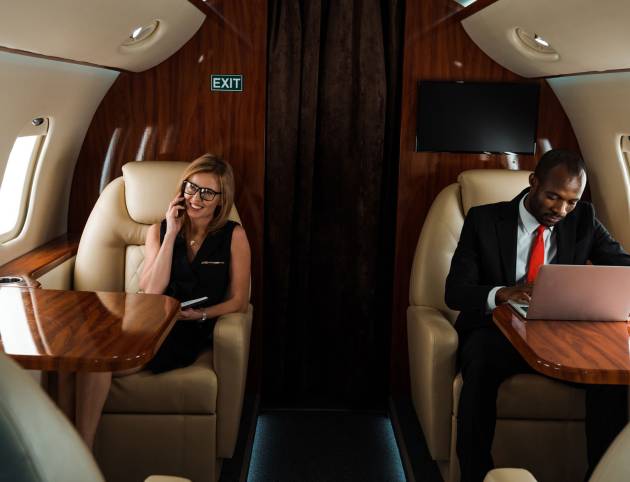 african-american-businessman-using-laptop-near-bus-2024-11-11-22-26-29-utc